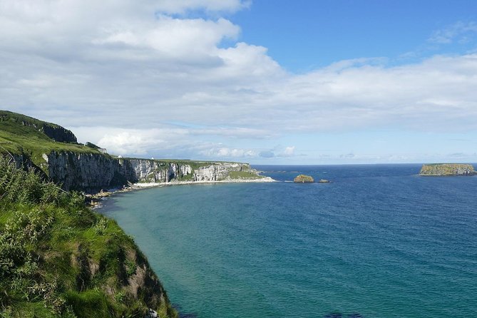 2-Day Northern Ireland Rail Tour: Belfast, Antrim Coast, and Giant's Causeway - Dunluce Castle and the coastal photo stop