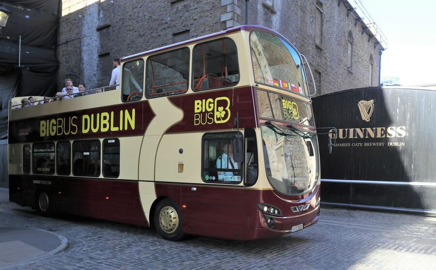 Dublin: Guinness Storehouse Ticket & Hop-on Hop-off Bus Tour - Reading Dublin from the open-top bus
