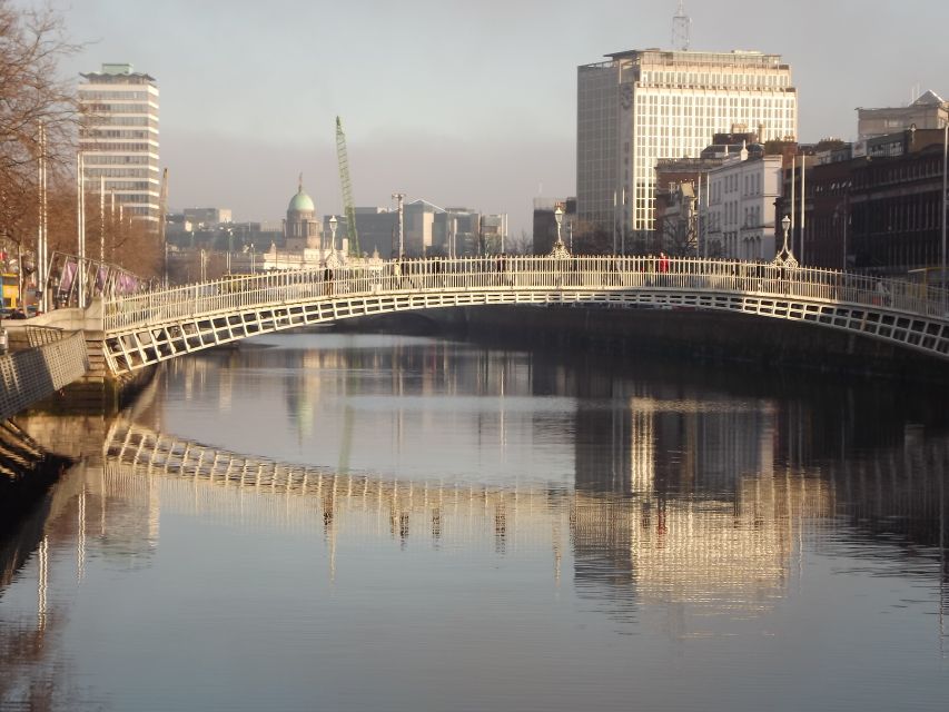 Dublin: Highlights and Hidden Corners Walking Tour - Crossing the Liffey by Millennium Bridge
