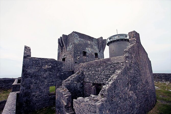 Electric biking on Inishmore island. Aran island. Self-guided. Full day. - Stone forts, churches, and standing stones