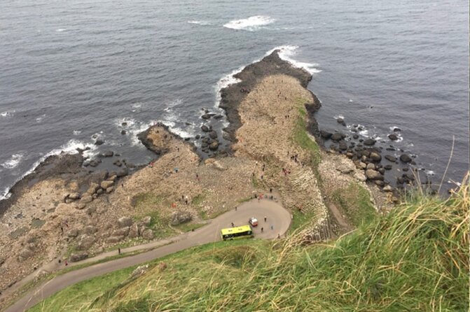 Giants Causeway with Private Chauffeur Day Tour from Dublin - Dunluce Castle above the Atlantic